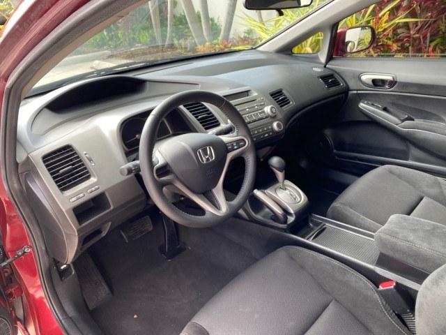 2010 Tango Red Pearl /Black Honda Civic Sdn LX-S LOW MILES 18,946 1 OWNER (2HGFA1F64AH) with an 1.8L SOHC MPFI 16-Valve i-VTEC I4 Engine engine, Automatic transmission, located at 4701 North Dixie Hwy, Pompano Beach, FL, 33064, (954) 422-2889, 26.240938, -80.123474 - OUR WEBPAGE FLORIDACARS1.COM HAS OVER 100 PHOTOS AND FREE CARFAX LINK 2010 Honda Civic LX-S 1 OWNER Sedan 4 DR 1.8L I4 F SOHC 16V Gasoline 36 MPG Front Wheel Drive Features ABS Brakes Air Conditioning Alloy Wheels AM/FM Stereo Automatic Transmission Auxiliary Audio Input CD Audio Cloth Seats Cruise- Photo#46