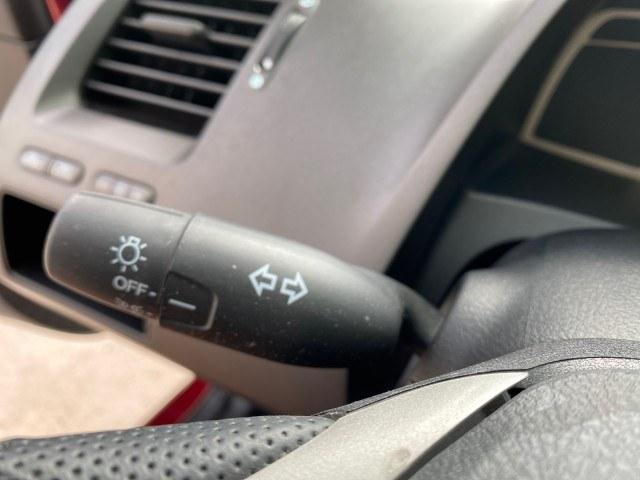 2010 Tango Red Pearl /Black Honda Civic Sdn LX-S LOW MILES 18,946 1 OWNER (2HGFA1F64AH) with an 1.8L SOHC MPFI 16-Valve i-VTEC I4 Engine engine, Automatic transmission, located at 4701 North Dixie Hwy, Pompano Beach, FL, 33064, (954) 422-2889, 26.240938, -80.123474 - OUR WEBPAGE FLORIDACARS1.COM HAS OVER 100 PHOTOS AND FREE CARFAX LINK 2010 Honda Civic LX-S 1 OWNER Sedan 4 DR 1.8L I4 F SOHC 16V Gasoline 36 MPG Front Wheel Drive Features ABS Brakes Air Conditioning Alloy Wheels AM/FM Stereo Automatic Transmission Auxiliary Audio Input CD Audio Cloth Seats Cruise- Photo#52