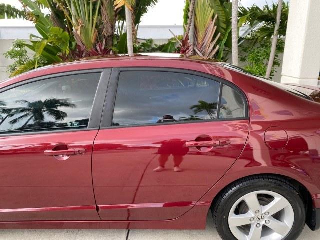 2010 Tango Red Pearl /Black Honda Civic Sdn LX-S LOW MILES 18,946 1 OWNER (2HGFA1F64AH) with an 1.8L SOHC MPFI 16-Valve i-VTEC I4 Engine engine, Automatic transmission, located at 4701 North Dixie Hwy, Pompano Beach, FL, 33064, (954) 422-2889, 26.240938, -80.123474 - OUR WEBPAGE FLORIDACARS1.COM HAS OVER 100 PHOTOS AND FREE CARFAX LINK 2010 Honda Civic LX-S 1 OWNER Sedan 4 DR 1.8L I4 F SOHC 16V Gasoline 36 MPG Front Wheel Drive Features ABS Brakes Air Conditioning Alloy Wheels AM/FM Stereo Automatic Transmission Auxiliary Audio Input CD Audio Cloth Seats Cruise- Photo#70