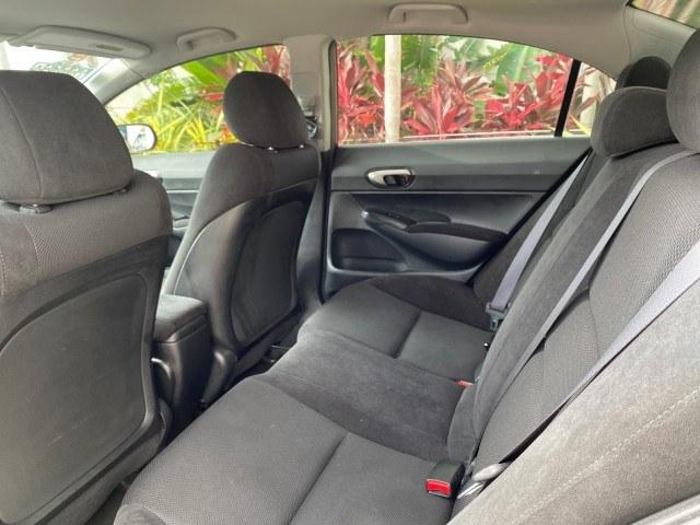 2010 Tango Red Pearl /Black Honda Civic Sdn LX-S LOW MILES 18,946 1 OWNER (2HGFA1F64AH) with an 1.8L SOHC MPFI 16-Valve i-VTEC I4 Engine engine, Automatic transmission, located at 4701 North Dixie Hwy, Pompano Beach, FL, 33064, (954) 422-2889, 26.240938, -80.123474 - OUR WEBPAGE FLORIDACARS1.COM HAS OVER 100 PHOTOS AND FREE CARFAX LINK 2010 Honda Civic LX-S 1 OWNER Sedan 4 DR 1.8L I4 F SOHC 16V Gasoline 36 MPG Front Wheel Drive Features ABS Brakes Air Conditioning Alloy Wheels AM/FM Stereo Automatic Transmission Auxiliary Audio Input CD Audio Cloth Seats Cruise- Photo#76