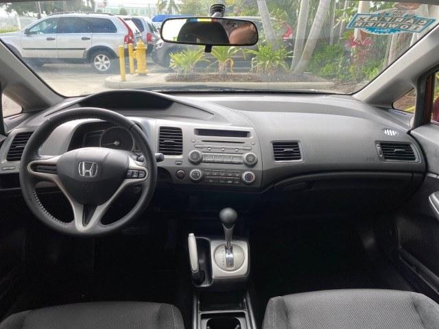 2010 Tango Red Pearl /Black Honda Civic Sdn LX-S LOW MILES 18,946 1 OWNER (2HGFA1F64AH) with an 1.8L SOHC MPFI 16-Valve i-VTEC I4 Engine engine, Automatic transmission, located at 4701 North Dixie Hwy, Pompano Beach, FL, 33064, (954) 422-2889, 26.240938, -80.123474 - OUR WEBPAGE FLORIDACARS1.COM HAS OVER 100 PHOTOS AND FREE CARFAX LINK 2010 Honda Civic LX-S 1 OWNER Sedan 4 DR 1.8L I4 F SOHC 16V Gasoline 36 MPG Front Wheel Drive Features ABS Brakes Air Conditioning Alloy Wheels AM/FM Stereo Automatic Transmission Auxiliary Audio Input CD Audio Cloth Seats Cruise- Photo#80