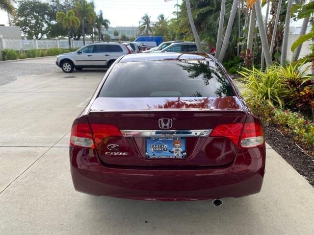 2010 Tango Red Pearl /Black Honda Civic Sdn LX-S LOW MILES 18,946 1 OWNER (2HGFA1F64AH) with an 1.8L SOHC MPFI 16-Valve i-VTEC I4 Engine engine, Automatic transmission, located at 4701 North Dixie Hwy, Pompano Beach, FL, 33064, (954) 422-2889, 26.240938, -80.123474 - OUR WEBPAGE FLORIDACARS1.COM HAS OVER 100 PHOTOS AND FREE CARFAX LINK 2010 Honda Civic LX-S 1 OWNER Sedan 4 DR 1.8L I4 F SOHC 16V Gasoline 36 MPG Front Wheel Drive Features ABS Brakes Air Conditioning Alloy Wheels AM/FM Stereo Automatic Transmission Auxiliary Audio Input CD Audio Cloth Seats Cruise- Photo#88