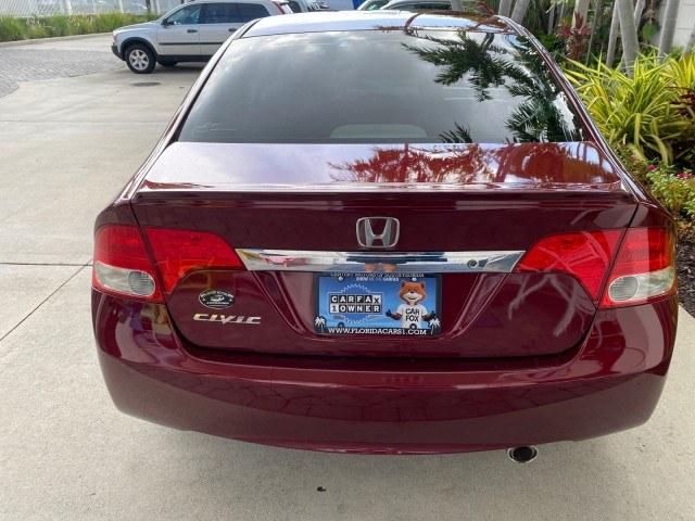 2010 Tango Red Pearl /Black Honda Civic Sdn LX-S LOW MILES 18,946 1 OWNER (2HGFA1F64AH) with an 1.8L SOHC MPFI 16-Valve i-VTEC I4 Engine engine, Automatic transmission, located at 4701 North Dixie Hwy, Pompano Beach, FL, 33064, (954) 422-2889, 26.240938, -80.123474 - OUR WEBPAGE FLORIDACARS1.COM HAS OVER 100 PHOTOS AND FREE CARFAX LINK 2010 Honda Civic LX-S 1 OWNER Sedan 4 DR 1.8L I4 F SOHC 16V Gasoline 36 MPG Front Wheel Drive Features ABS Brakes Air Conditioning Alloy Wheels AM/FM Stereo Automatic Transmission Auxiliary Audio Input CD Audio Cloth Seats Cruise- Photo#89