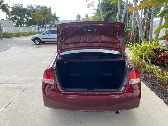 2010 Tango Red Pearl /Black Honda Civic Sdn LX-S LOW MILES 18,946 1 OWNER (2HGFA1F64AH) with an 1.8L SOHC MPFI 16-Valve i-VTEC I4 Engine engine, Automatic transmission, located at 4701 North Dixie Hwy, Pompano Beach, FL, 33064, (954) 422-2889, 26.240938, -80.123474 - OUR WEBPAGE FLORIDACARS1.COM HAS OVER 100 PHOTOS AND FREE CARFAX LINK 2010 Honda Civic LX-S 1 OWNER Sedan 4 DR 1.8L I4 F SOHC 16V Gasoline 36 MPG Front Wheel Drive Features ABS Brakes Air Conditioning Alloy Wheels AM/FM Stereo Automatic Transmission Auxiliary Audio Input CD Audio Cloth Seats Cruise- Photo#93