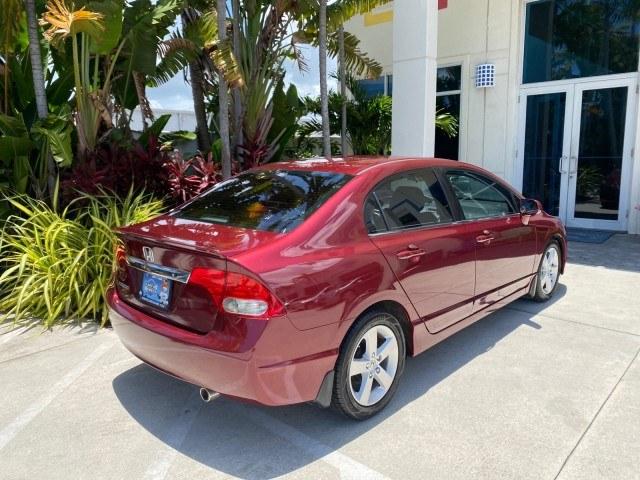 2010 Tango Red Pearl /Black Honda Civic Sdn LX-S LOW MILES 18,946 1 OWNER (2HGFA1F64AH) with an 1.8L SOHC MPFI 16-Valve i-VTEC I4 Engine engine, Automatic transmission, located at 4701 North Dixie Hwy, Pompano Beach, FL, 33064, (954) 422-2889, 26.240938, -80.123474 - OUR WEBPAGE FLORIDACARS1.COM HAS OVER 100 PHOTOS AND FREE CARFAX LINK 2010 Honda Civic LX-S 1 OWNER Sedan 4 DR 1.8L I4 F SOHC 16V Gasoline 36 MPG Front Wheel Drive Features ABS Brakes Air Conditioning Alloy Wheels AM/FM Stereo Automatic Transmission Auxiliary Audio Input CD Audio Cloth Seats Cruise- Photo#99