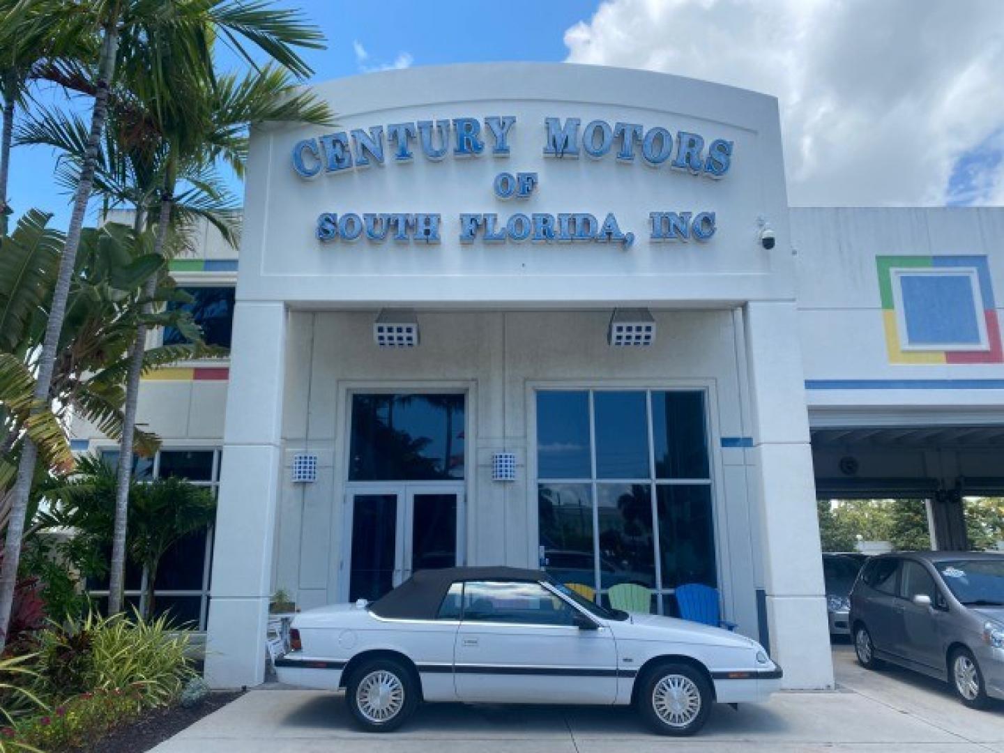 1993 White /Black Chrysler Lebaron CONV LX LOW MILES 26,305 (1C3XU5532PF) with an 3.0L SMFI 6-Cyl Engine engine, Automatic transmission, located at 4701 North Dixie Hwy, Pompano Beach, FL, 33064, (954) 422-2889, 26.240938, -80.123474 - OUR WEBPAGE FLORIDACARS1.COM HAS OVER 100 PHOTOS AND FREE CARFAX LINK 1993 Chrysler LeBaron Convertible 3.0L V6 F SOHC 12V Gasoline Front Wheel Drive Features ABS Brakes Air Conditioning Alloy Wheels AM/FM Stereo Automatic Transmission Cassette Player Cruise Control Leather Seats Power Locks Power S- Photo#0