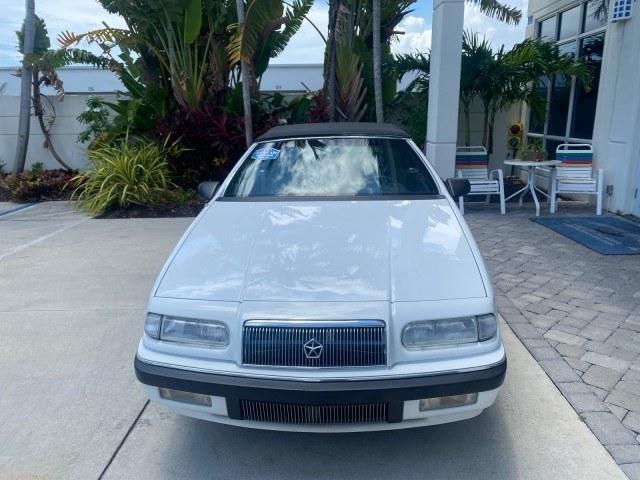 1993 White /Black Chrysler Lebaron CONV LX LOW MILES 26,305 (1C3XU5532PF) with an 3.0L SMFI 6-Cyl Engine engine, Automatic transmission, located at 4701 North Dixie Hwy, Pompano Beach, FL, 33064, (954) 422-2889, 26.240938, -80.123474 - OUR WEBPAGE FLORIDACARS1.COM HAS OVER 100 PHOTOS AND FREE CARFAX LINK 1993 Chrysler LeBaron Convertible 3.0L V6 F SOHC 12V Gasoline Front Wheel Drive Features ABS Brakes Air Conditioning Alloy Wheels AM/FM Stereo Automatic Transmission Cassette Player Cruise Control Leather Seats Power Locks Power S- Photo#2