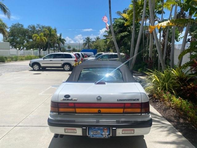 1993 White /Black Chrysler Lebaron CONV LX LOW MILES 26,305 (1C3XU5532PF) with an 3.0L SMFI 6-Cyl Engine engine, Automatic transmission, located at 4701 North Dixie Hwy, Pompano Beach, FL, 33064, (954) 422-2889, 26.240938, -80.123474 - OUR WEBPAGE FLORIDACARS1.COM HAS OVER 100 PHOTOS AND FREE CARFAX LINK 1993 Chrysler LeBaron Convertible 3.0L V6 F SOHC 12V Gasoline Front Wheel Drive Features ABS Brakes Air Conditioning Alloy Wheels AM/FM Stereo Automatic Transmission Cassette Player Cruise Control Leather Seats Power Locks Power S- Photo#6