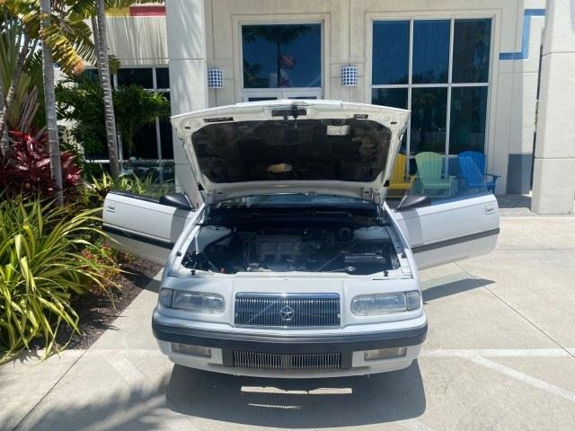 1993 White /Black Chrysler Lebaron CONV LX LOW MILES 26,305 (1C3XU5532PF) with an 3.0L SMFI 6-Cyl Engine engine, Automatic transmission, located at 4701 North Dixie Hwy, Pompano Beach, FL, 33064, (954) 422-2889, 26.240938, -80.123474 - OUR WEBPAGE FLORIDACARS1.COM HAS OVER 100 PHOTOS AND FREE CARFAX LINK 1993 Chrysler LeBaron Convertible 3.0L V6 F SOHC 12V Gasoline Front Wheel Drive Features ABS Brakes Air Conditioning Alloy Wheels AM/FM Stereo Automatic Transmission Cassette Player Cruise Control Leather Seats Power Locks Power S- Photo#16