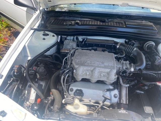 1993 White /Black Chrysler Lebaron CONV LX LOW MILES 26,305 (1C3XU5532PF) with an 3.0L SMFI 6-Cyl Engine engine, Automatic transmission, located at 4701 North Dixie Hwy, Pompano Beach, FL, 33064, (954) 422-2889, 26.240938, -80.123474 - OUR WEBPAGE FLORIDACARS1.COM HAS OVER 100 PHOTOS AND FREE CARFAX LINK 1993 Chrysler LeBaron Convertible 3.0L V6 F SOHC 12V Gasoline Front Wheel Drive Features ABS Brakes Air Conditioning Alloy Wheels AM/FM Stereo Automatic Transmission Cassette Player Cruise Control Leather Seats Power Locks Power S- Photo#24