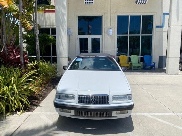 1993 White /Black Chrysler Lebaron CONV LX LOW MILES 26,305 (1C3XU5532PF) with an 3.0L SMFI 6-Cyl Engine engine, Automatic transmission, located at 4701 North Dixie Hwy, Pompano Beach, FL, 33064, (954) 422-2889, 26.240938, -80.123474 - OUR WEBPAGE FLORIDACARS1.COM HAS OVER 100 PHOTOS AND FREE CARFAX LINK 1993 Chrysler LeBaron Convertible 3.0L V6 F SOHC 12V Gasoline Front Wheel Drive Features ABS Brakes Air Conditioning Alloy Wheels AM/FM Stereo Automatic Transmission Cassette Player Cruise Control Leather Seats Power Locks Power S- Photo#26