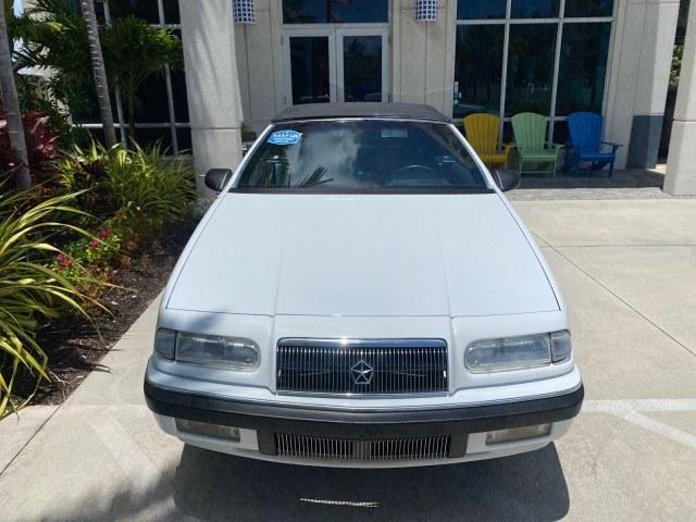 1993 White /Black Chrysler Lebaron CONV LX LOW MILES 26,305 (1C3XU5532PF) with an 3.0L SMFI 6-Cyl Engine engine, Automatic transmission, located at 4701 North Dixie Hwy, Pompano Beach, FL, 33064, (954) 422-2889, 26.240938, -80.123474 - OUR WEBPAGE FLORIDACARS1.COM HAS OVER 100 PHOTOS AND FREE CARFAX LINK 1993 Chrysler LeBaron Convertible 3.0L V6 F SOHC 12V Gasoline Front Wheel Drive Features ABS Brakes Air Conditioning Alloy Wheels AM/FM Stereo Automatic Transmission Cassette Player Cruise Control Leather Seats Power Locks Power S- Photo#27