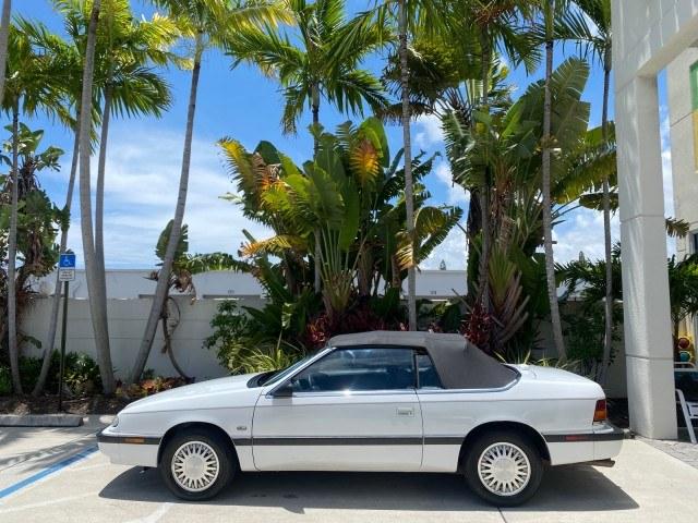 1993 White /Black Chrysler Lebaron CONV LX LOW MILES 26,305 (1C3XU5532PF) with an 3.0L SMFI 6-Cyl Engine engine, Automatic transmission, located at 4701 North Dixie Hwy, Pompano Beach, FL, 33064, (954) 422-2889, 26.240938, -80.123474 - OUR WEBPAGE FLORIDACARS1.COM HAS OVER 100 PHOTOS AND FREE CARFAX LINK 1993 Chrysler LeBaron Convertible 3.0L V6 F SOHC 12V Gasoline Front Wheel Drive Features ABS Brakes Air Conditioning Alloy Wheels AM/FM Stereo Automatic Transmission Cassette Player Cruise Control Leather Seats Power Locks Power S- Photo#30