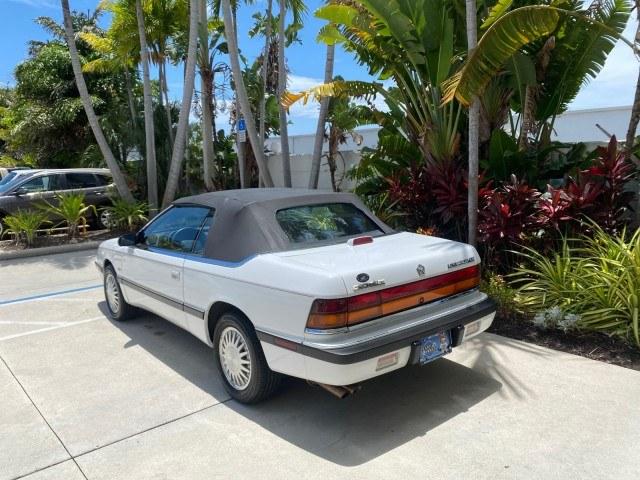 1993 White /Black Chrysler Lebaron CONV LX LOW MILES 26,305 (1C3XU5532PF) with an 3.0L SMFI 6-Cyl Engine engine, Automatic transmission, located at 4701 North Dixie Hwy, Pompano Beach, FL, 33064, (954) 422-2889, 26.240938, -80.123474 - OUR WEBPAGE FLORIDACARS1.COM HAS OVER 100 PHOTOS AND FREE CARFAX LINK 1993 Chrysler LeBaron Convertible 3.0L V6 F SOHC 12V Gasoline Front Wheel Drive Features ABS Brakes Air Conditioning Alloy Wheels AM/FM Stereo Automatic Transmission Cassette Player Cruise Control Leather Seats Power Locks Power S- Photo#32