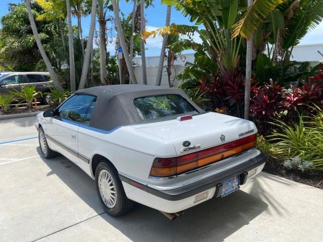 1993 White /Black Chrysler Lebaron CONV LX LOW MILES 26,305 (1C3XU5532PF) with an 3.0L SMFI 6-Cyl Engine engine, Automatic transmission, located at 4701 North Dixie Hwy, Pompano Beach, FL, 33064, (954) 422-2889, 26.240938, -80.123474 - OUR WEBPAGE FLORIDACARS1.COM HAS OVER 100 PHOTOS AND FREE CARFAX LINK 1993 Chrysler LeBaron Convertible 3.0L V6 F SOHC 12V Gasoline Front Wheel Drive Features ABS Brakes Air Conditioning Alloy Wheels AM/FM Stereo Automatic Transmission Cassette Player Cruise Control Leather Seats Power Locks Power S- Photo#33