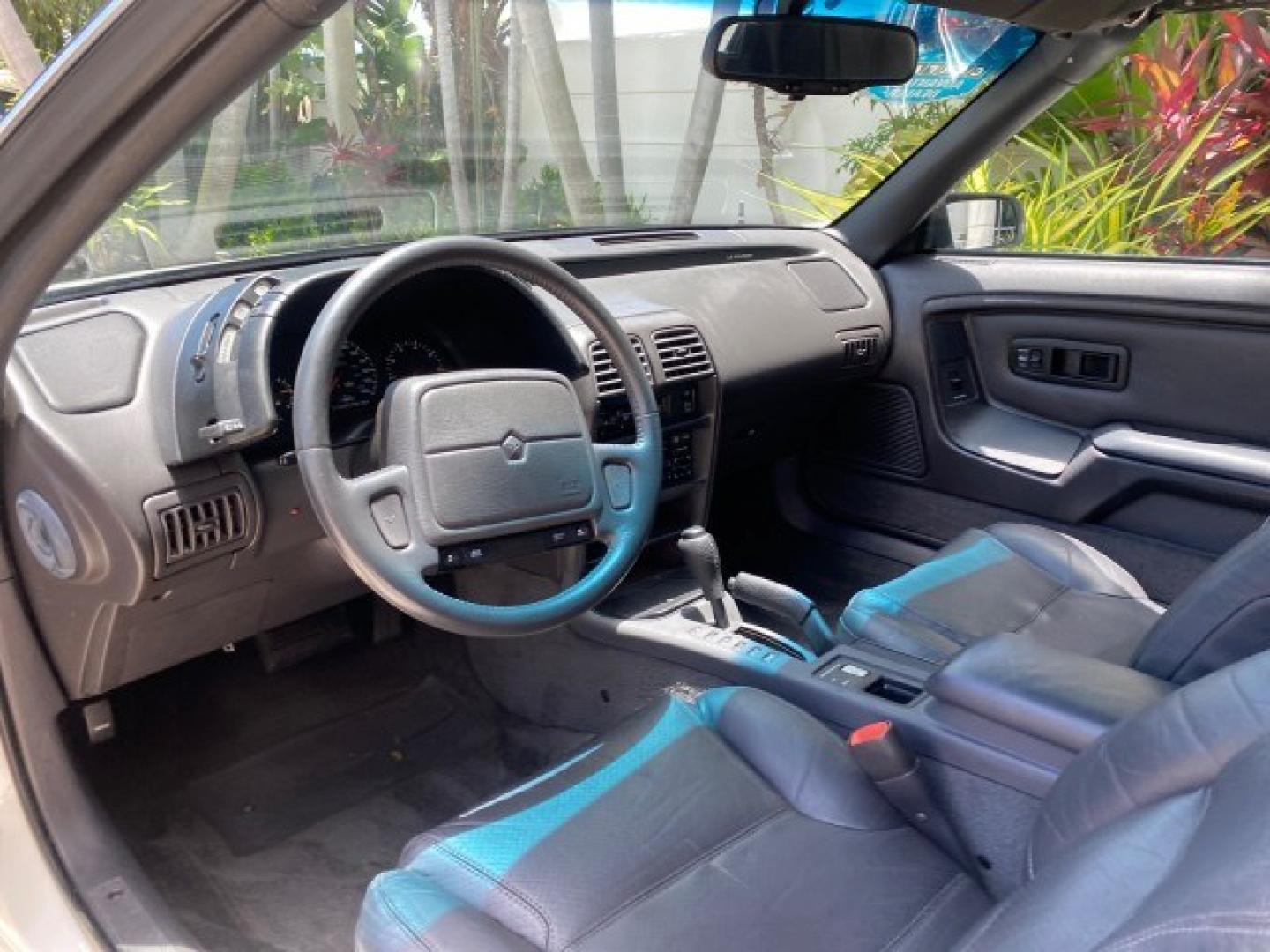 1993 White /Black Chrysler Lebaron CONV LX LOW MILES 26,305 (1C3XU5532PF) with an 3.0L SMFI 6-Cyl Engine engine, Automatic transmission, located at 4701 North Dixie Hwy, Pompano Beach, FL, 33064, (954) 422-2889, 26.240938, -80.123474 - OUR WEBPAGE FLORIDACARS1.COM HAS OVER 100 PHOTOS AND FREE CARFAX LINK 1993 Chrysler LeBaron Convertible 3.0L V6 F SOHC 12V Gasoline Front Wheel Drive Features ABS Brakes Air Conditioning Alloy Wheels AM/FM Stereo Automatic Transmission Cassette Player Cruise Control Leather Seats Power Locks Power S- Photo#47