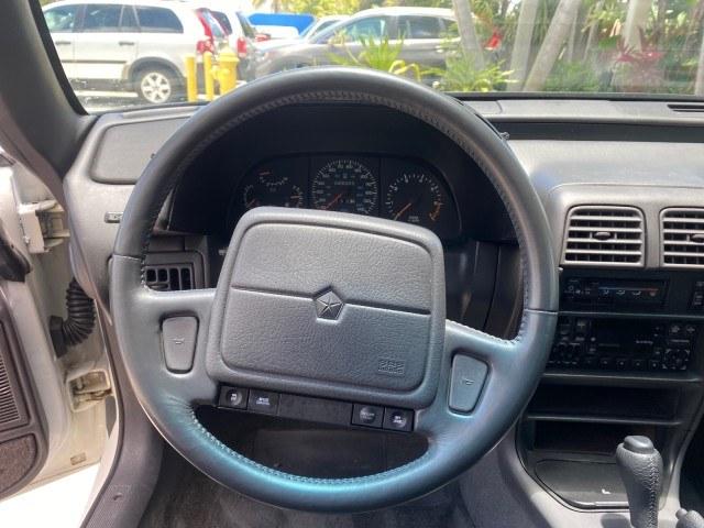 1993 White /Black Chrysler Lebaron CONV LX LOW MILES 26,305 (1C3XU5532PF) with an 3.0L SMFI 6-Cyl Engine engine, Automatic transmission, located at 4701 North Dixie Hwy, Pompano Beach, FL, 33064, (954) 422-2889, 26.240938, -80.123474 - OUR WEBPAGE FLORIDACARS1.COM HAS OVER 100 PHOTOS AND FREE CARFAX LINK 1993 Chrysler LeBaron Convertible 3.0L V6 F SOHC 12V Gasoline Front Wheel Drive Features ABS Brakes Air Conditioning Alloy Wheels AM/FM Stereo Automatic Transmission Cassette Player Cruise Control Leather Seats Power Locks Power S- Photo#48