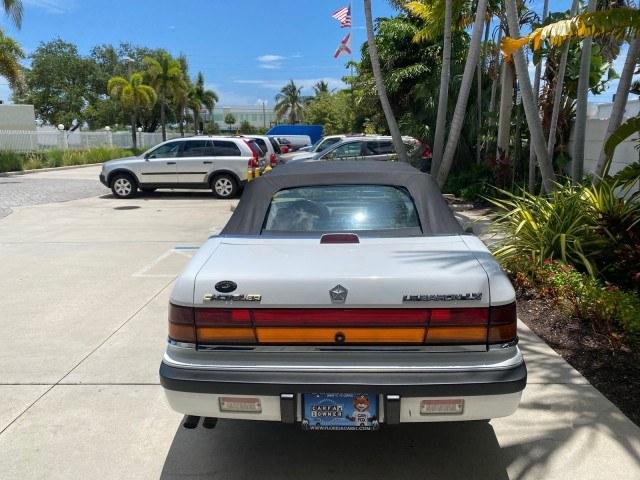 1993 White /Black Chrysler Lebaron CONV LX LOW MILES 26,305 (1C3XU5532PF) with an 3.0L SMFI 6-Cyl Engine engine, Automatic transmission, located at 4701 North Dixie Hwy, Pompano Beach, FL, 33064, (954) 422-2889, 26.240938, -80.123474 - OUR WEBPAGE FLORIDACARS1.COM HAS OVER 100 PHOTOS AND FREE CARFAX LINK 1993 Chrysler LeBaron Convertible 3.0L V6 F SOHC 12V Gasoline Front Wheel Drive Features ABS Brakes Air Conditioning Alloy Wheels AM/FM Stereo Automatic Transmission Cassette Player Cruise Control Leather Seats Power Locks Power S- Photo#75