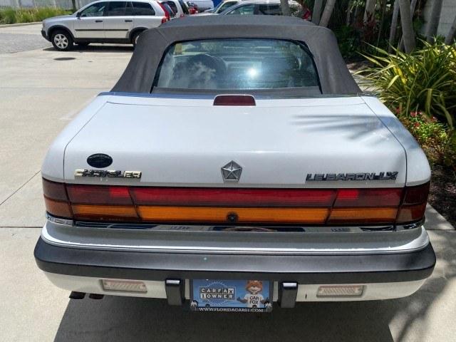 1993 White /Black Chrysler Lebaron CONV LX LOW MILES 26,305 (1C3XU5532PF) with an 3.0L SMFI 6-Cyl Engine engine, Automatic transmission, located at 4701 North Dixie Hwy, Pompano Beach, FL, 33064, (954) 422-2889, 26.240938, -80.123474 - OUR WEBPAGE FLORIDACARS1.COM HAS OVER 100 PHOTOS AND FREE CARFAX LINK 1993 Chrysler LeBaron Convertible 3.0L V6 F SOHC 12V Gasoline Front Wheel Drive Features ABS Brakes Air Conditioning Alloy Wheels AM/FM Stereo Automatic Transmission Cassette Player Cruise Control Leather Seats Power Locks Power S- Photo#76