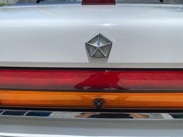 1993 White /Black Chrysler Lebaron CONV LX LOW MILES 26,305 (1C3XU5532PF) with an 3.0L SMFI 6-Cyl Engine engine, Automatic transmission, located at 4701 North Dixie Hwy, Pompano Beach, FL, 33064, (954) 422-2889, 26.240938, -80.123474 - OUR WEBPAGE FLORIDACARS1.COM HAS OVER 100 PHOTOS AND FREE CARFAX LINK 1993 Chrysler LeBaron Convertible 3.0L V6 F SOHC 12V Gasoline Front Wheel Drive Features ABS Brakes Air Conditioning Alloy Wheels AM/FM Stereo Automatic Transmission Cassette Player Cruise Control Leather Seats Power Locks Power S- Photo#79