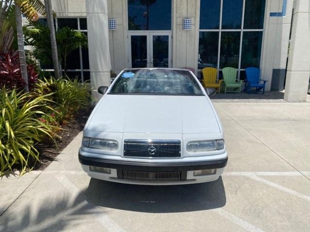 1993 White /Black Chrysler Lebaron CONV LX LOW MILES 26,305 (1C3XU5532PF) with an 3.0L SMFI 6-Cyl Engine engine, Automatic transmission, located at 4701 North Dixie Hwy, Pompano Beach, FL, 33064, (954) 422-2889, 26.240938, -80.123474 - OUR WEBPAGE FLORIDACARS1.COM HAS OVER 100 PHOTOS AND FREE CARFAX LINK 1993 Chrysler LeBaron Convertible 3.0L V6 F SOHC 12V Gasoline Front Wheel Drive Features ABS Brakes Air Conditioning Alloy Wheels AM/FM Stereo Automatic Transmission Cassette Player Cruise Control Leather Seats Power Locks Power S- Photo#82