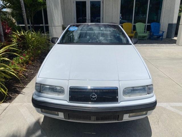 1993 White /Black Chrysler Lebaron CONV LX LOW MILES 26,305 (1C3XU5532PF) with an 3.0L SMFI 6-Cyl Engine engine, Automatic transmission, located at 4701 North Dixie Hwy, Pompano Beach, FL, 33064, (954) 422-2889, 26.240938, -80.123474 - OUR WEBPAGE FLORIDACARS1.COM HAS OVER 100 PHOTOS AND FREE CARFAX LINK 1993 Chrysler LeBaron Convertible 3.0L V6 F SOHC 12V Gasoline Front Wheel Drive Features ABS Brakes Air Conditioning Alloy Wheels AM/FM Stereo Automatic Transmission Cassette Player Cruise Control Leather Seats Power Locks Power S- Photo#83