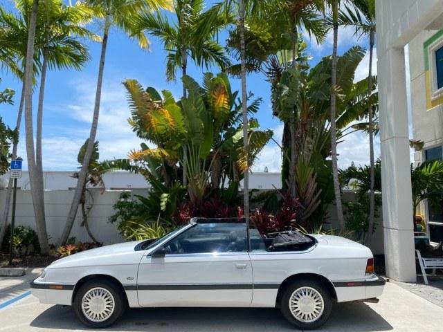 1993 White /Black Chrysler Lebaron CONV LX LOW MILES 26,305 (1C3XU5532PF) with an 3.0L SMFI 6-Cyl Engine engine, Automatic transmission, located at 4701 North Dixie Hwy, Pompano Beach, FL, 33064, (954) 422-2889, 26.240938, -80.123474 - OUR WEBPAGE FLORIDACARS1.COM HAS OVER 100 PHOTOS AND FREE CARFAX LINK 1993 Chrysler LeBaron Convertible 3.0L V6 F SOHC 12V Gasoline Front Wheel Drive Features ABS Brakes Air Conditioning Alloy Wheels AM/FM Stereo Automatic Transmission Cassette Player Cruise Control Leather Seats Power Locks Power S- Photo#87