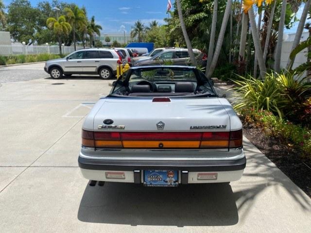 1993 White /Black Chrysler Lebaron CONV LX LOW MILES 26,305 (1C3XU5532PF) with an 3.0L SMFI 6-Cyl Engine engine, Automatic transmission, located at 4701 North Dixie Hwy, Pompano Beach, FL, 33064, (954) 422-2889, 26.240938, -80.123474 - OUR WEBPAGE FLORIDACARS1.COM HAS OVER 100 PHOTOS AND FREE CARFAX LINK 1993 Chrysler LeBaron Convertible 3.0L V6 F SOHC 12V Gasoline Front Wheel Drive Features ABS Brakes Air Conditioning Alloy Wheels AM/FM Stereo Automatic Transmission Cassette Player Cruise Control Leather Seats Power Locks Power S- Photo#90