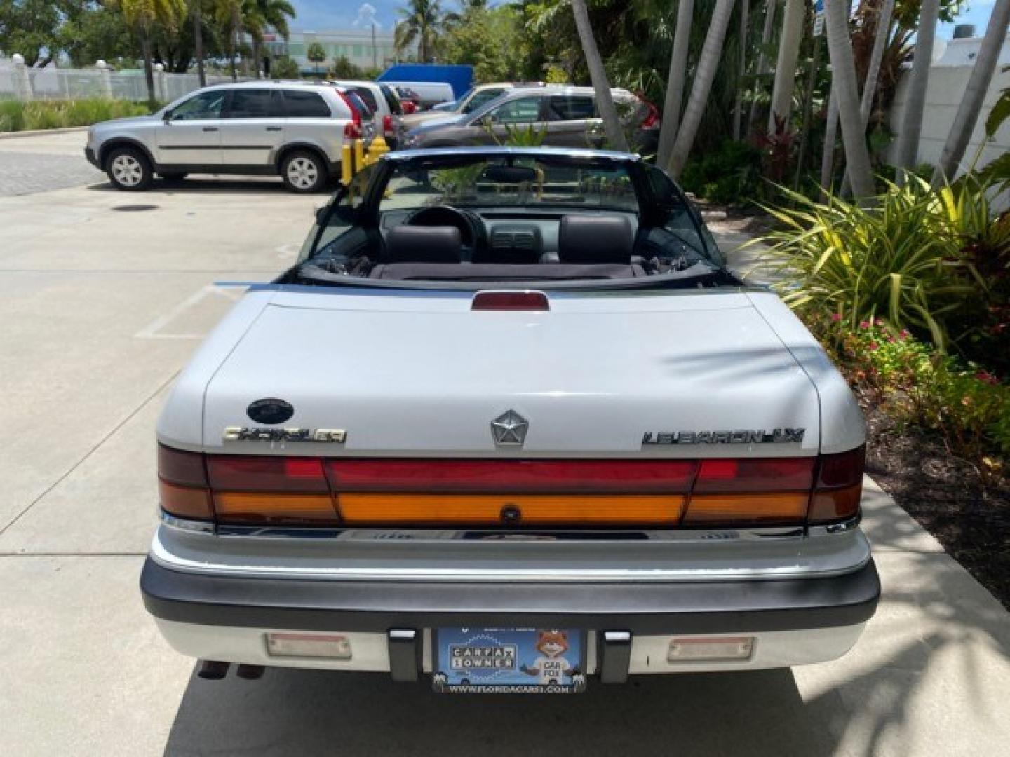 1993 White /Black Chrysler Lebaron CONV LX LOW MILES 26,305 (1C3XU5532PF) with an 3.0L SMFI 6-Cyl Engine engine, Automatic transmission, located at 4701 North Dixie Hwy, Pompano Beach, FL, 33064, (954) 422-2889, 26.240938, -80.123474 - OUR WEBPAGE FLORIDACARS1.COM HAS OVER 100 PHOTOS AND FREE CARFAX LINK 1993 Chrysler LeBaron Convertible 3.0L V6 F SOHC 12V Gasoline Front Wheel Drive Features ABS Brakes Air Conditioning Alloy Wheels AM/FM Stereo Automatic Transmission Cassette Player Cruise Control Leather Seats Power Locks Power S- Photo#91