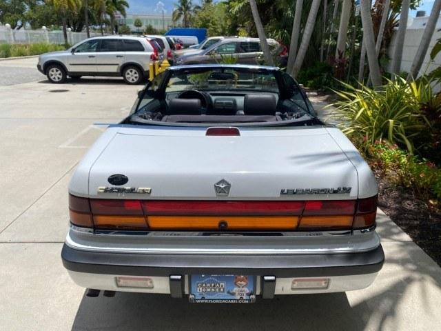 1993 White /Black Chrysler Lebaron CONV LX LOW MILES 26,305 (1C3XU5532PF) with an 3.0L SMFI 6-Cyl Engine engine, Automatic transmission, located at 4701 North Dixie Hwy, Pompano Beach, FL, 33064, (954) 422-2889, 26.240938, -80.123474 - OUR WEBPAGE FLORIDACARS1.COM HAS OVER 100 PHOTOS AND FREE CARFAX LINK 1993 Chrysler LeBaron Convertible 3.0L V6 F SOHC 12V Gasoline Front Wheel Drive Features ABS Brakes Air Conditioning Alloy Wheels AM/FM Stereo Automatic Transmission Cassette Player Cruise Control Leather Seats Power Locks Power S- Photo#91