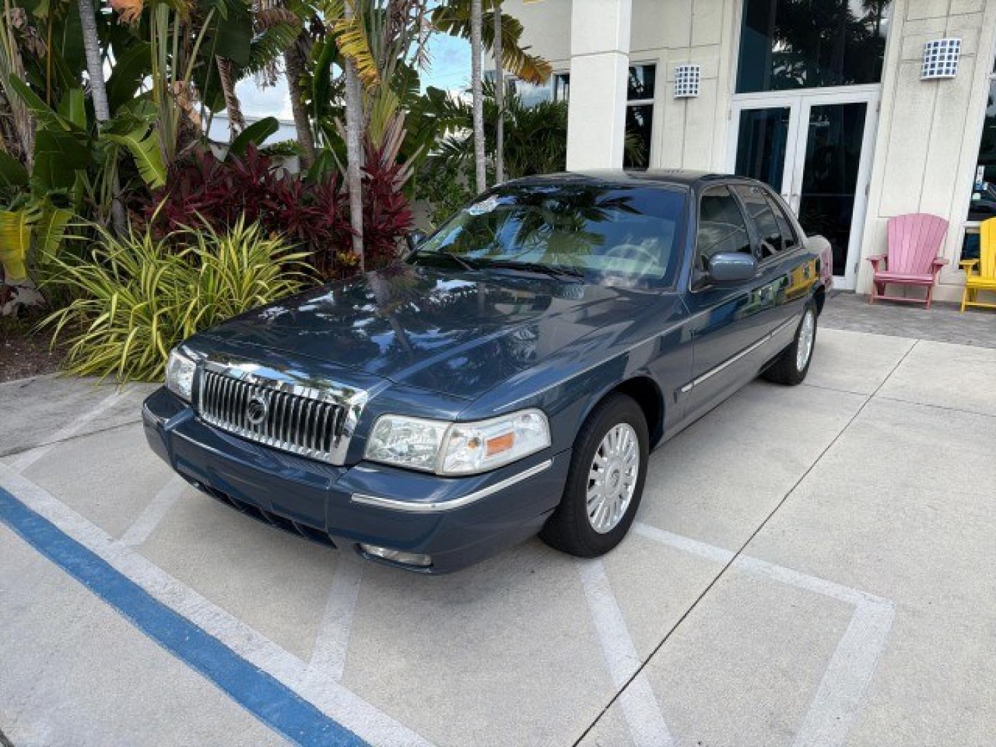2007 Norsea Blue Pearl Metallic /Light Camel Mercury Grand Marquis LS LOW MILES 52,607 1 OWNER (2MEHM75V17X) with an 4.6L SOHC FFV V8 Engine engine, Automatic transmission, located at 4701 North Dixie Hwy, Pompano Beach, FL, 33064, (954) 422-2889, 26.240938, -80.123474 - OUR WEBPAGE FLORIDACARS1.COM HAS OVER 100 PHOTOS AND FREE CARFAX LINK 2007 Mercury Grand Marquis LS Sedan 4 DR 4.6L V8 F SOHC Flex Fuel 25 MPG Rear Wheel Drive Features ABS Brakes Air Conditioning Alloy Wheels AM/FM Stereo Automatic Transmission CD Audio Cruise Control Flex Fuel Vehicle Leather Seat- Photo#2