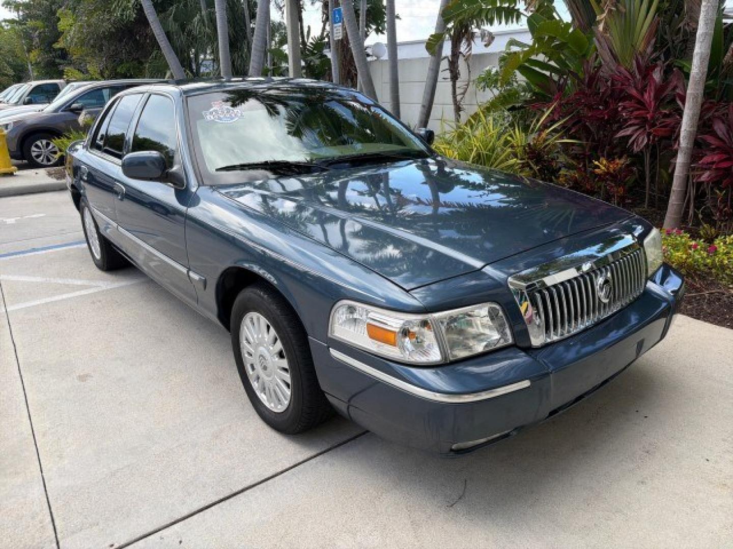 2007 Norsea Blue Pearl Metallic /Light Camel Mercury Grand Marquis LS LOW MILES 52,607 1 OWNER (2MEHM75V17X) with an 4.6L SOHC FFV V8 Engine engine, Automatic transmission, located at 4701 North Dixie Hwy, Pompano Beach, FL, 33064, (954) 422-2889, 26.240938, -80.123474 - OUR WEBPAGE FLORIDACARS1.COM HAS OVER 100 PHOTOS AND FREE CARFAX LINK 2007 Mercury Grand Marquis LS Sedan 4 DR 4.6L V8 F SOHC Flex Fuel 25 MPG Rear Wheel Drive Features ABS Brakes Air Conditioning Alloy Wheels AM/FM Stereo Automatic Transmission CD Audio Cruise Control Flex Fuel Vehicle Leather Seat- Photo#4