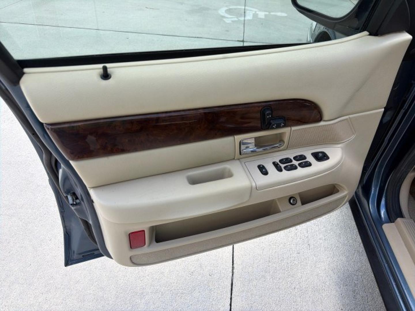 2007 Norsea Blue Pearl Metallic /Light Camel Mercury Grand Marquis LS LOW MILES 52,607 1 OWNER (2MEHM75V17X) with an 4.6L SOHC FFV V8 Engine engine, Automatic transmission, located at 4701 North Dixie Hwy, Pompano Beach, FL, 33064, (954) 422-2889, 26.240938, -80.123474 - OUR WEBPAGE FLORIDACARS1.COM HAS OVER 100 PHOTOS AND FREE CARFAX LINK 2007 Mercury Grand Marquis LS Sedan 4 DR 4.6L V8 F SOHC Flex Fuel 25 MPG Rear Wheel Drive Features ABS Brakes Air Conditioning Alloy Wheels AM/FM Stereo Automatic Transmission CD Audio Cruise Control Flex Fuel Vehicle Leather Seat- Photo#12