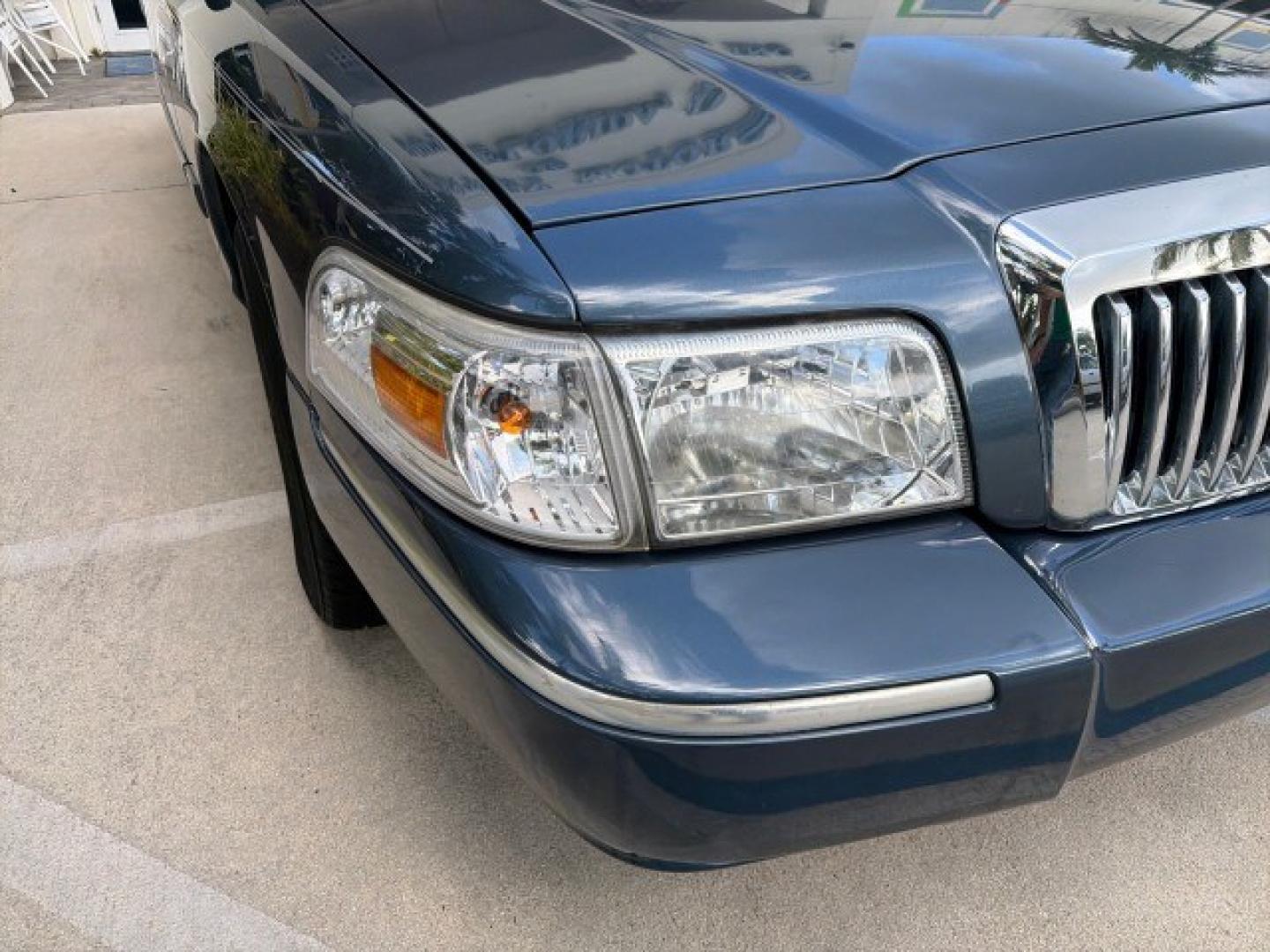 2007 Norsea Blue Pearl Metallic /Light Camel Mercury Grand Marquis LS LOW MILES 52,607 1 OWNER (2MEHM75V17X) with an 4.6L SOHC FFV V8 Engine engine, Automatic transmission, located at 4701 North Dixie Hwy, Pompano Beach, FL, 33064, (954) 422-2889, 26.240938, -80.123474 - OUR WEBPAGE FLORIDACARS1.COM HAS OVER 100 PHOTOS AND FREE CARFAX LINK 2007 Mercury Grand Marquis LS Sedan 4 DR 4.6L V8 F SOHC Flex Fuel 25 MPG Rear Wheel Drive Features ABS Brakes Air Conditioning Alloy Wheels AM/FM Stereo Automatic Transmission CD Audio Cruise Control Flex Fuel Vehicle Leather Seat- Photo#24