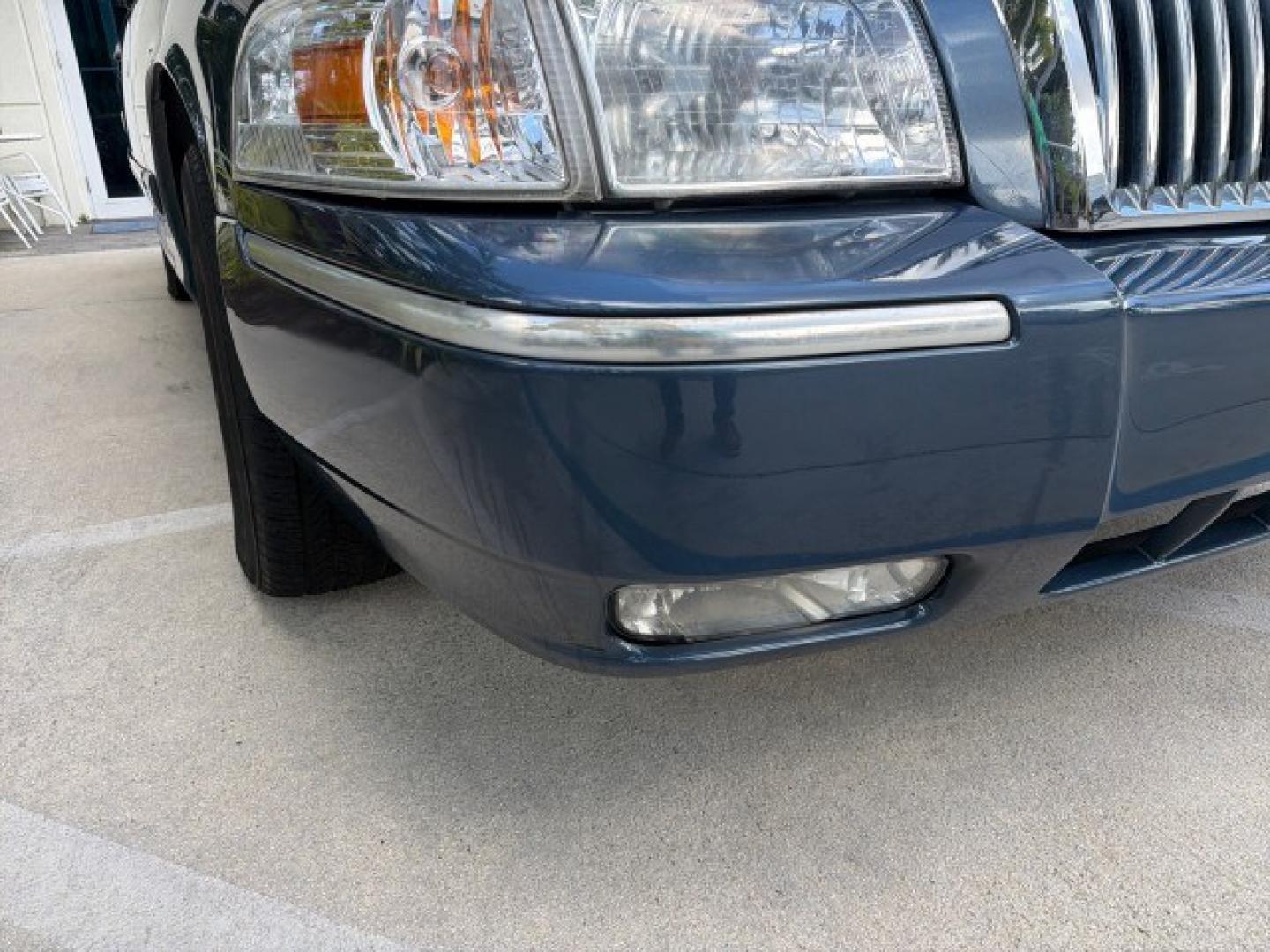 2007 Norsea Blue Pearl Metallic /Light Camel Mercury Grand Marquis LS LOW MILES 52,607 1 OWNER (2MEHM75V17X) with an 4.6L SOHC FFV V8 Engine engine, Automatic transmission, located at 4701 North Dixie Hwy, Pompano Beach, FL, 33064, (954) 422-2889, 26.240938, -80.123474 - OUR WEBPAGE FLORIDACARS1.COM HAS OVER 100 PHOTOS AND FREE CARFAX LINK 2007 Mercury Grand Marquis LS Sedan 4 DR 4.6L V8 F SOHC Flex Fuel 25 MPG Rear Wheel Drive Features ABS Brakes Air Conditioning Alloy Wheels AM/FM Stereo Automatic Transmission CD Audio Cruise Control Flex Fuel Vehicle Leather Seat- Photo#25