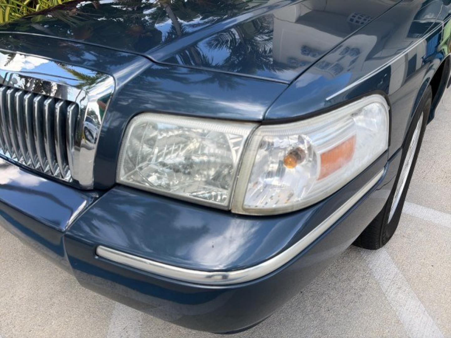 2007 Norsea Blue Pearl Metallic /Light Camel Mercury Grand Marquis LS LOW MILES 52,607 1 OWNER (2MEHM75V17X) with an 4.6L SOHC FFV V8 Engine engine, Automatic transmission, located at 4701 North Dixie Hwy, Pompano Beach, FL, 33064, (954) 422-2889, 26.240938, -80.123474 - OUR WEBPAGE FLORIDACARS1.COM HAS OVER 100 PHOTOS AND FREE CARFAX LINK 2007 Mercury Grand Marquis LS Sedan 4 DR 4.6L V8 F SOHC Flex Fuel 25 MPG Rear Wheel Drive Features ABS Brakes Air Conditioning Alloy Wheels AM/FM Stereo Automatic Transmission CD Audio Cruise Control Flex Fuel Vehicle Leather Seat- Photo#27