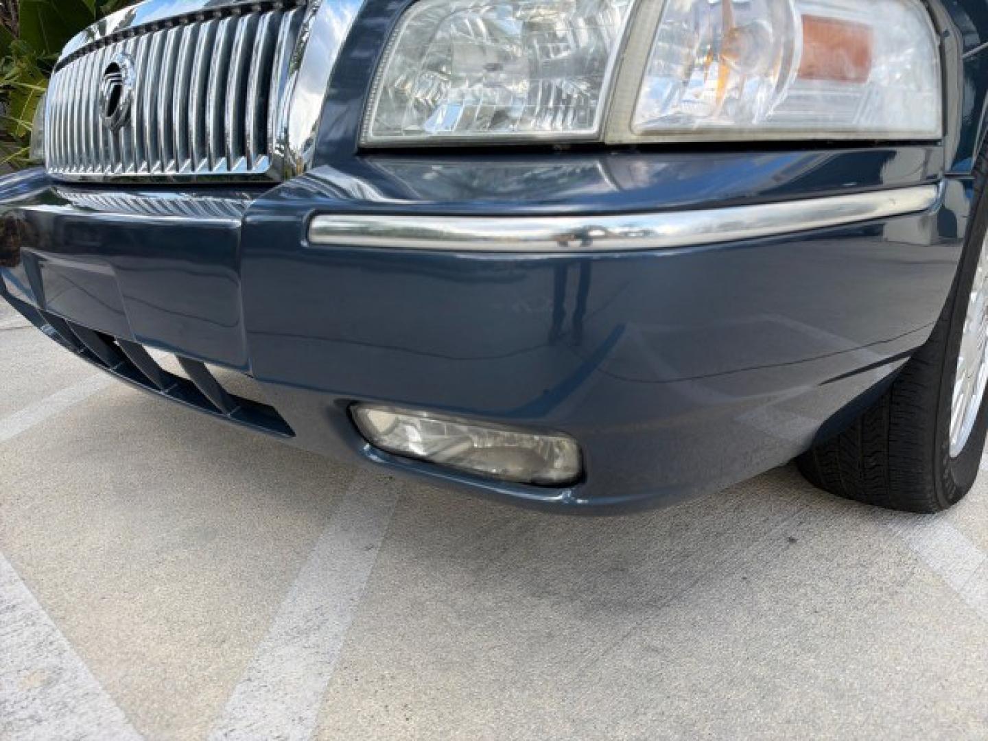2007 Norsea Blue Pearl Metallic /Light Camel Mercury Grand Marquis LS LOW MILES 52,607 1 OWNER (2MEHM75V17X) with an 4.6L SOHC FFV V8 Engine engine, Automatic transmission, located at 4701 North Dixie Hwy, Pompano Beach, FL, 33064, (954) 422-2889, 26.240938, -80.123474 - OUR WEBPAGE FLORIDACARS1.COM HAS OVER 100 PHOTOS AND FREE CARFAX LINK 2007 Mercury Grand Marquis LS Sedan 4 DR 4.6L V8 F SOHC Flex Fuel 25 MPG Rear Wheel Drive Features ABS Brakes Air Conditioning Alloy Wheels AM/FM Stereo Automatic Transmission CD Audio Cruise Control Flex Fuel Vehicle Leather Seat- Photo#28