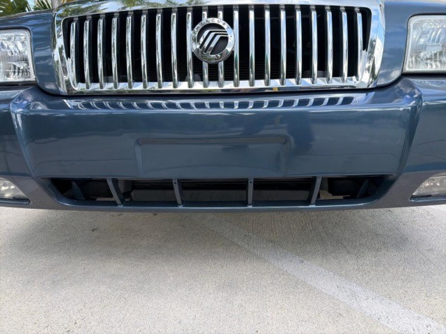 2007 Norsea Blue Pearl Metallic /Light Camel Mercury Grand Marquis LS LOW MILES 52,607 1 OWNER (2MEHM75V17X) with an 4.6L SOHC FFV V8 Engine engine, Automatic transmission, located at 4701 North Dixie Hwy, Pompano Beach, FL, 33064, (954) 422-2889, 26.240938, -80.123474 - OUR WEBPAGE FLORIDACARS1.COM HAS OVER 100 PHOTOS AND FREE CARFAX LINK 2007 Mercury Grand Marquis LS Sedan 4 DR 4.6L V8 F SOHC Flex Fuel 25 MPG Rear Wheel Drive Features ABS Brakes Air Conditioning Alloy Wheels AM/FM Stereo Automatic Transmission CD Audio Cruise Control Flex Fuel Vehicle Leather Seat- Photo#29