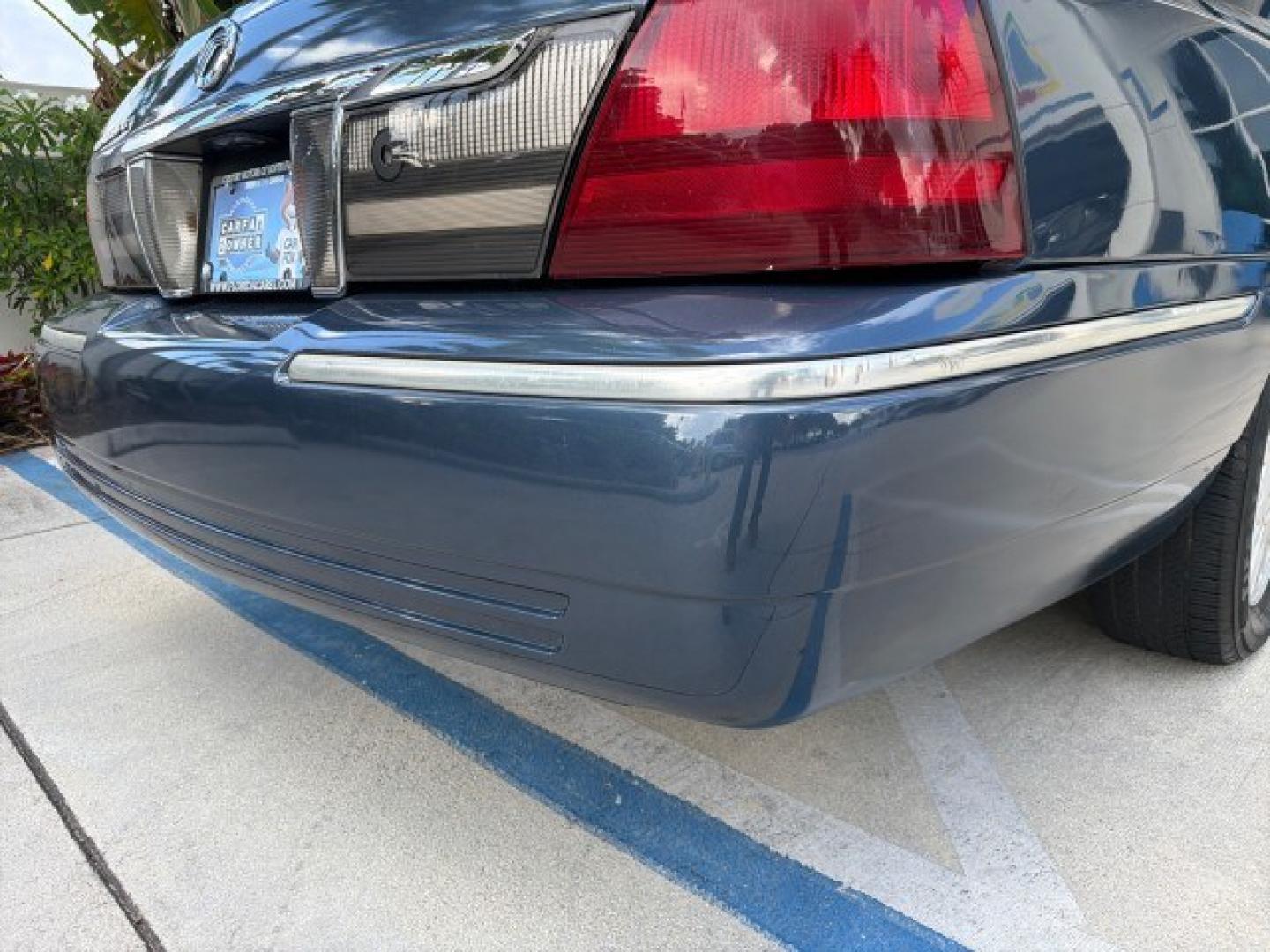 2007 Norsea Blue Pearl Metallic /Light Camel Mercury Grand Marquis LS LOW MILES 52,607 1 OWNER (2MEHM75V17X) with an 4.6L SOHC FFV V8 Engine engine, Automatic transmission, located at 4701 North Dixie Hwy, Pompano Beach, FL, 33064, (954) 422-2889, 26.240938, -80.123474 - OUR WEBPAGE FLORIDACARS1.COM HAS OVER 100 PHOTOS AND FREE CARFAX LINK 2007 Mercury Grand Marquis LS Sedan 4 DR 4.6L V8 F SOHC Flex Fuel 25 MPG Rear Wheel Drive Features ABS Brakes Air Conditioning Alloy Wheels AM/FM Stereo Automatic Transmission CD Audio Cruise Control Flex Fuel Vehicle Leather Seat- Photo#36