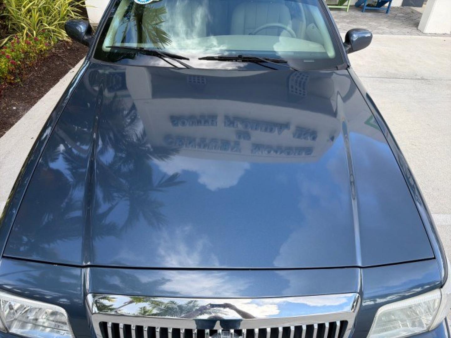 2007 Norsea Blue Pearl Metallic /Light Camel Mercury Grand Marquis LS LOW MILES 52,607 1 OWNER (2MEHM75V17X) with an 4.6L SOHC FFV V8 Engine engine, Automatic transmission, located at 4701 North Dixie Hwy, Pompano Beach, FL, 33064, (954) 422-2889, 26.240938, -80.123474 - OUR WEBPAGE FLORIDACARS1.COM HAS OVER 100 PHOTOS AND FREE CARFAX LINK 2007 Mercury Grand Marquis LS Sedan 4 DR 4.6L V8 F SOHC Flex Fuel 25 MPG Rear Wheel Drive Features ABS Brakes Air Conditioning Alloy Wheels AM/FM Stereo Automatic Transmission CD Audio Cruise Control Flex Fuel Vehicle Leather Seat- Photo#39