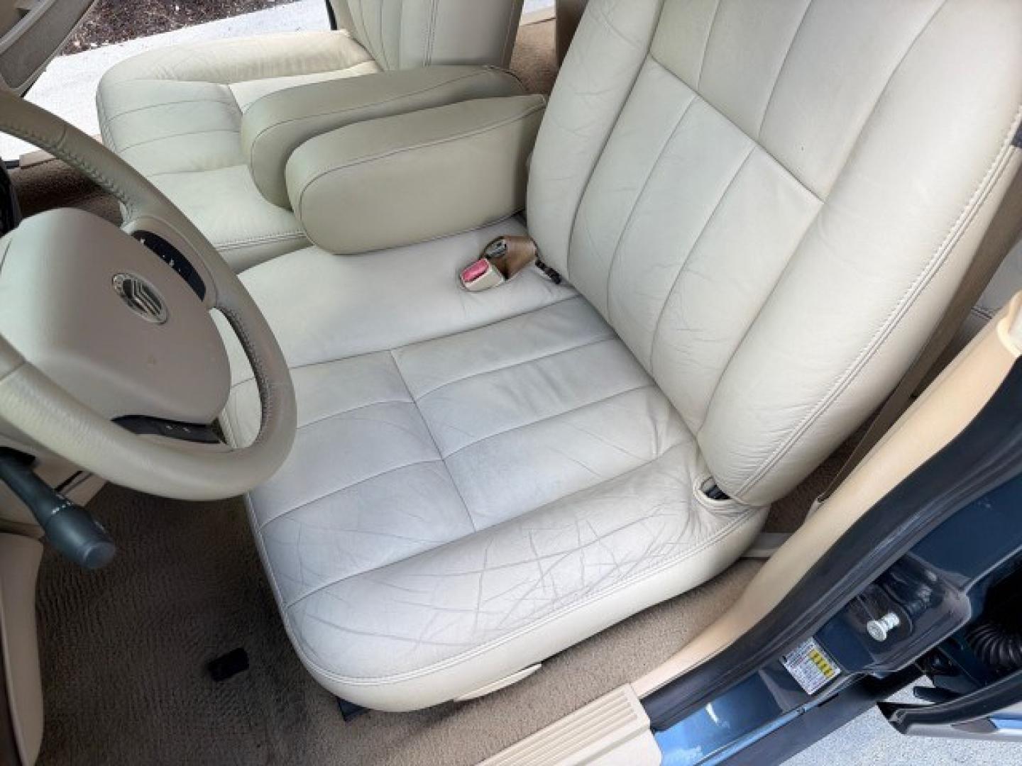 2007 Norsea Blue Pearl Metallic /Light Camel Mercury Grand Marquis LS LOW MILES 52,607 1 OWNER (2MEHM75V17X) with an 4.6L SOHC FFV V8 Engine engine, Automatic transmission, located at 4701 North Dixie Hwy, Pompano Beach, FL, 33064, (954) 422-2889, 26.240938, -80.123474 - OUR WEBPAGE FLORIDACARS1.COM HAS OVER 100 PHOTOS AND FREE CARFAX LINK 2007 Mercury Grand Marquis LS Sedan 4 DR 4.6L V8 F SOHC Flex Fuel 25 MPG Rear Wheel Drive Features ABS Brakes Air Conditioning Alloy Wheels AM/FM Stereo Automatic Transmission CD Audio Cruise Control Flex Fuel Vehicle Leather Seat- Photo#65