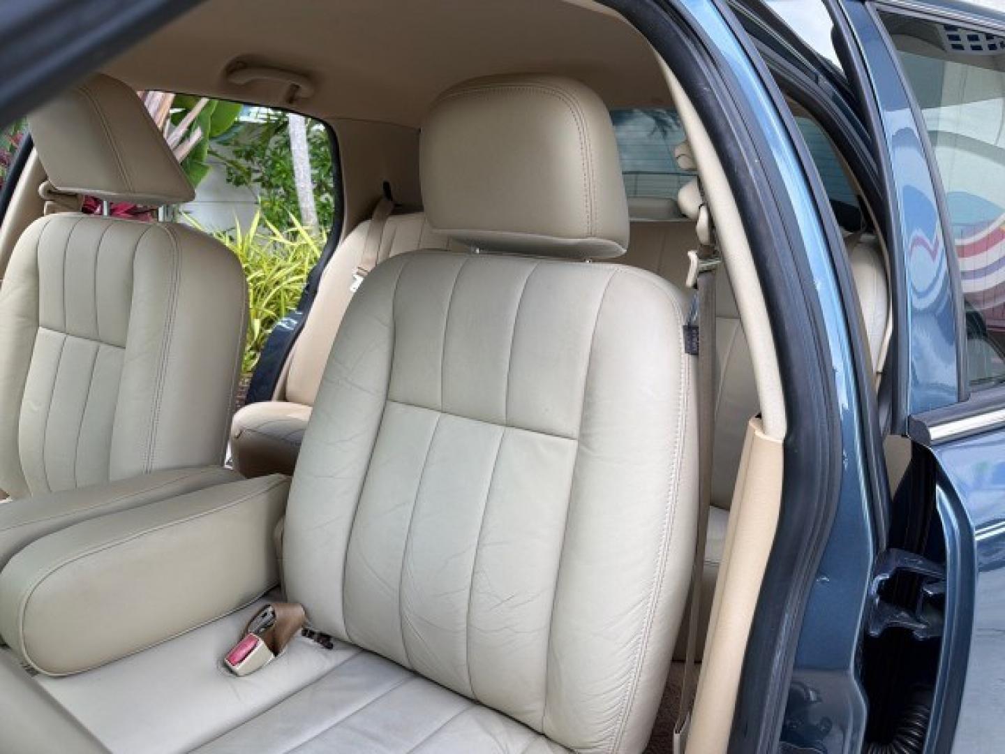 2007 Norsea Blue Pearl Metallic /Light Camel Mercury Grand Marquis LS LOW MILES 52,607 1 OWNER (2MEHM75V17X) with an 4.6L SOHC FFV V8 Engine engine, Automatic transmission, located at 4701 North Dixie Hwy, Pompano Beach, FL, 33064, (954) 422-2889, 26.240938, -80.123474 - OUR WEBPAGE FLORIDACARS1.COM HAS OVER 100 PHOTOS AND FREE CARFAX LINK 2007 Mercury Grand Marquis LS Sedan 4 DR 4.6L V8 F SOHC Flex Fuel 25 MPG Rear Wheel Drive Features ABS Brakes Air Conditioning Alloy Wheels AM/FM Stereo Automatic Transmission CD Audio Cruise Control Flex Fuel Vehicle Leather Seat- Photo#66