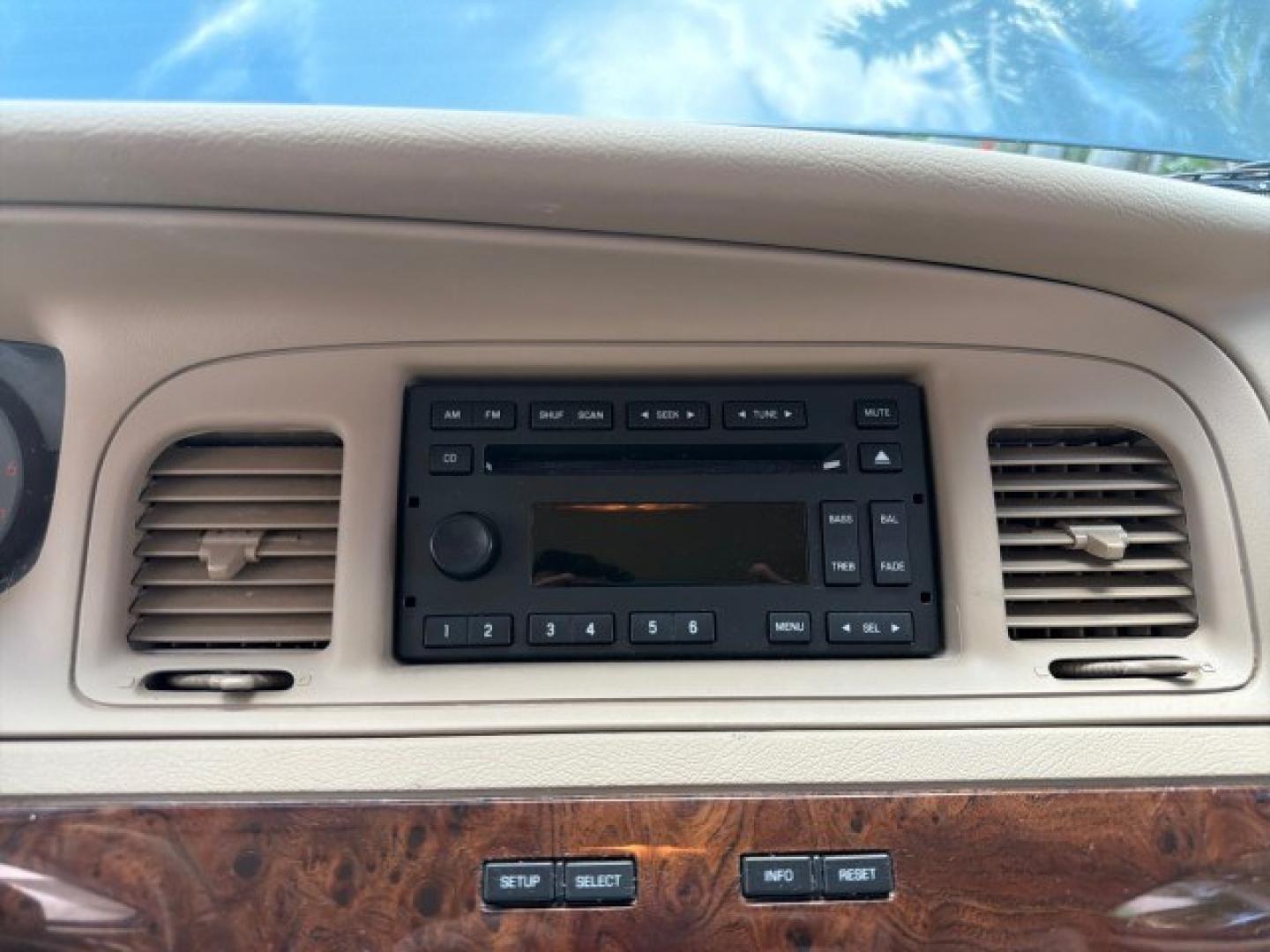 2007 Norsea Blue Pearl Metallic /Light Camel Mercury Grand Marquis LS LOW MILES 52,607 1 OWNER (2MEHM75V17X) with an 4.6L SOHC FFV V8 Engine engine, Automatic transmission, located at 4701 North Dixie Hwy, Pompano Beach, FL, 33064, (954) 422-2889, 26.240938, -80.123474 - OUR WEBPAGE FLORIDACARS1.COM HAS OVER 100 PHOTOS AND FREE CARFAX LINK 2007 Mercury Grand Marquis LS Sedan 4 DR 4.6L V8 F SOHC Flex Fuel 25 MPG Rear Wheel Drive Features ABS Brakes Air Conditioning Alloy Wheels AM/FM Stereo Automatic Transmission CD Audio Cruise Control Flex Fuel Vehicle Leather Seat- Photo#70