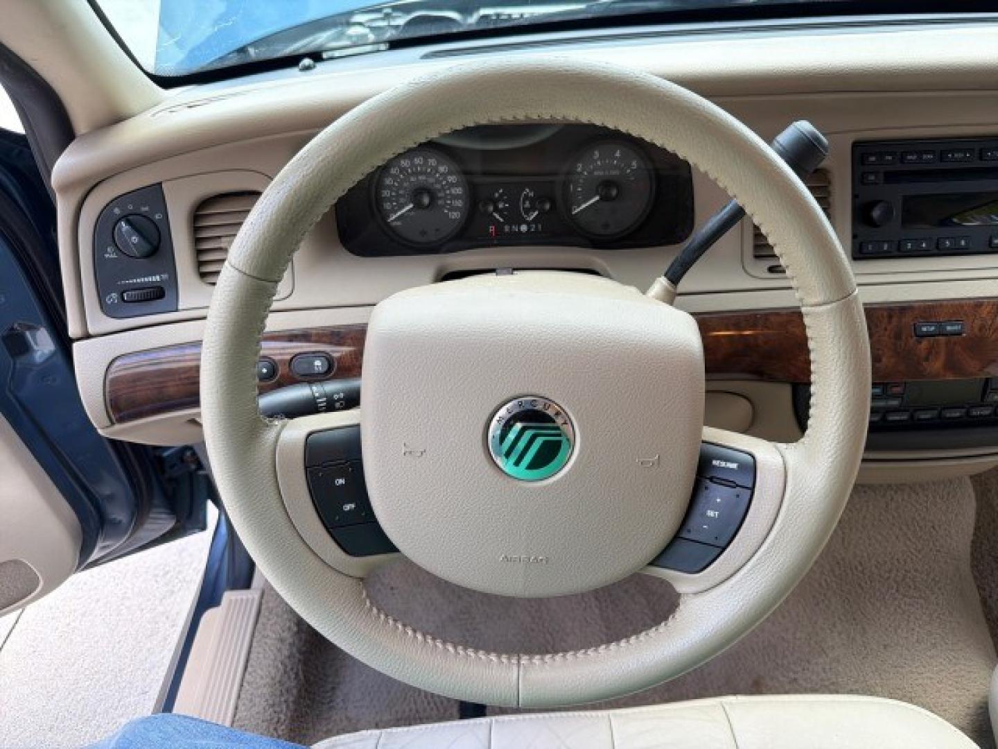 2007 Norsea Blue Pearl Metallic /Light Camel Mercury Grand Marquis LS LOW MILES 52,607 1 OWNER (2MEHM75V17X) with an 4.6L SOHC FFV V8 Engine engine, Automatic transmission, located at 4701 North Dixie Hwy, Pompano Beach, FL, 33064, (954) 422-2889, 26.240938, -80.123474 - OUR WEBPAGE FLORIDACARS1.COM HAS OVER 100 PHOTOS AND FREE CARFAX LINK 2007 Mercury Grand Marquis LS Sedan 4 DR 4.6L V8 F SOHC Flex Fuel 25 MPG Rear Wheel Drive Features ABS Brakes Air Conditioning Alloy Wheels AM/FM Stereo Automatic Transmission CD Audio Cruise Control Flex Fuel Vehicle Leather Seat- Photo#72