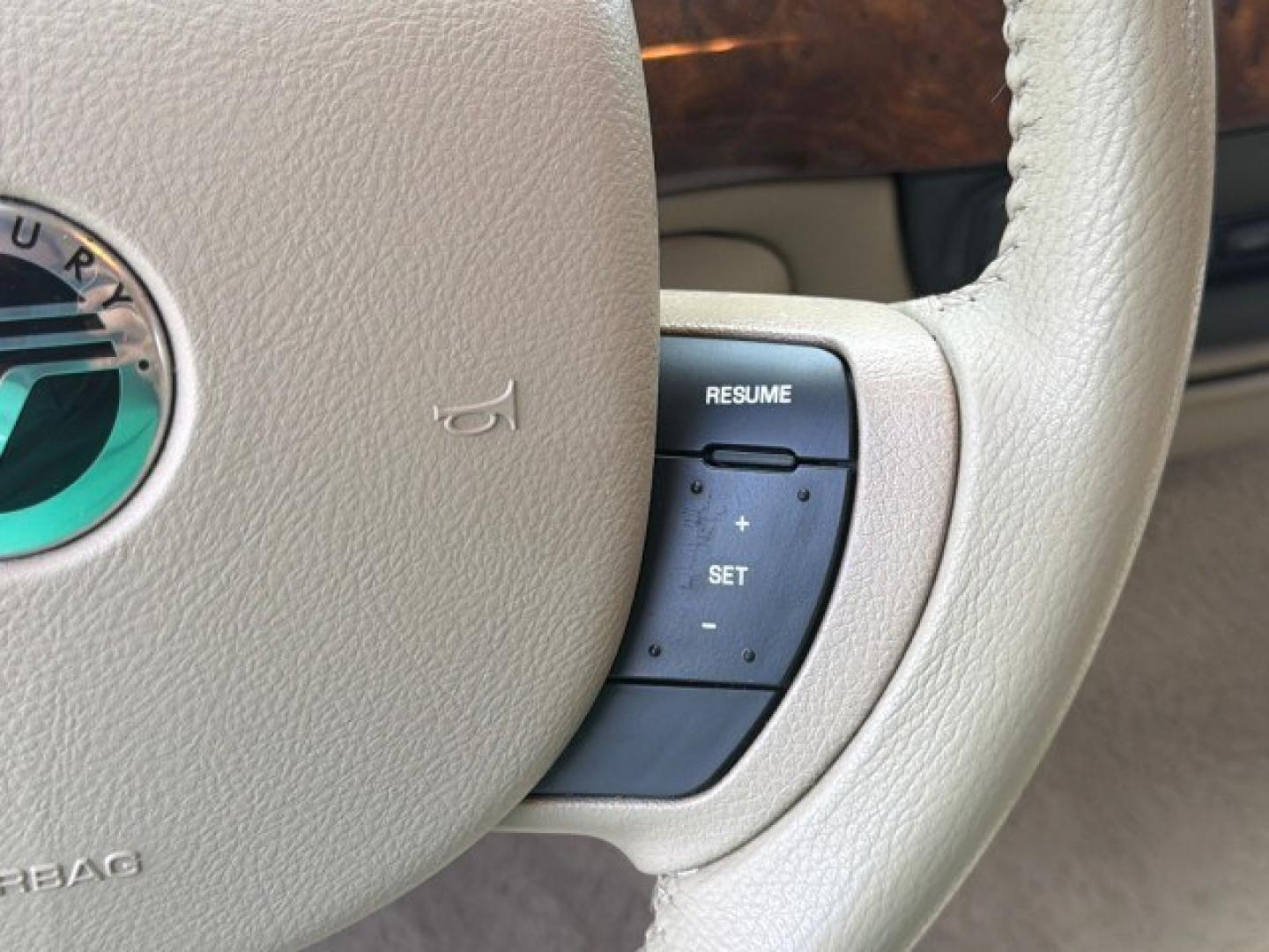 2007 Norsea Blue Pearl Metallic /Light Camel Mercury Grand Marquis LS LOW MILES 52,607 1 OWNER (2MEHM75V17X) with an 4.6L SOHC FFV V8 Engine engine, Automatic transmission, located at 4701 North Dixie Hwy, Pompano Beach, FL, 33064, (954) 422-2889, 26.240938, -80.123474 - OUR WEBPAGE FLORIDACARS1.COM HAS OVER 100 PHOTOS AND FREE CARFAX LINK 2007 Mercury Grand Marquis LS Sedan 4 DR 4.6L V8 F SOHC Flex Fuel 25 MPG Rear Wheel Drive Features ABS Brakes Air Conditioning Alloy Wheels AM/FM Stereo Automatic Transmission CD Audio Cruise Control Flex Fuel Vehicle Leather Seat- Photo#74