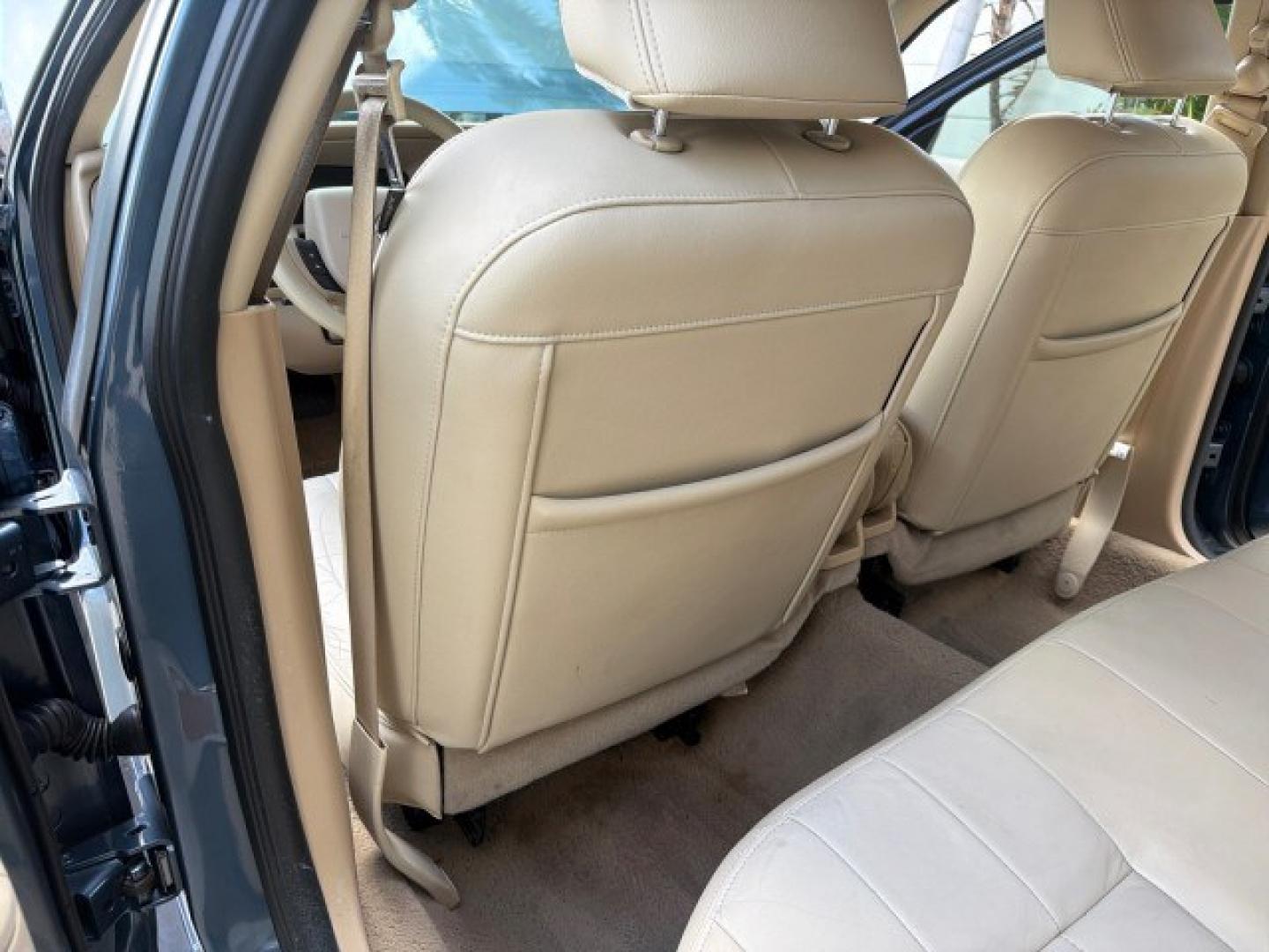 2007 Norsea Blue Pearl Metallic /Light Camel Mercury Grand Marquis LS LOW MILES 52,607 1 OWNER (2MEHM75V17X) with an 4.6L SOHC FFV V8 Engine engine, Automatic transmission, located at 4701 North Dixie Hwy, Pompano Beach, FL, 33064, (954) 422-2889, 26.240938, -80.123474 - OUR WEBPAGE FLORIDACARS1.COM HAS OVER 100 PHOTOS AND FREE CARFAX LINK 2007 Mercury Grand Marquis LS Sedan 4 DR 4.6L V8 F SOHC Flex Fuel 25 MPG Rear Wheel Drive Features ABS Brakes Air Conditioning Alloy Wheels AM/FM Stereo Automatic Transmission CD Audio Cruise Control Flex Fuel Vehicle Leather Seat- Photo#86