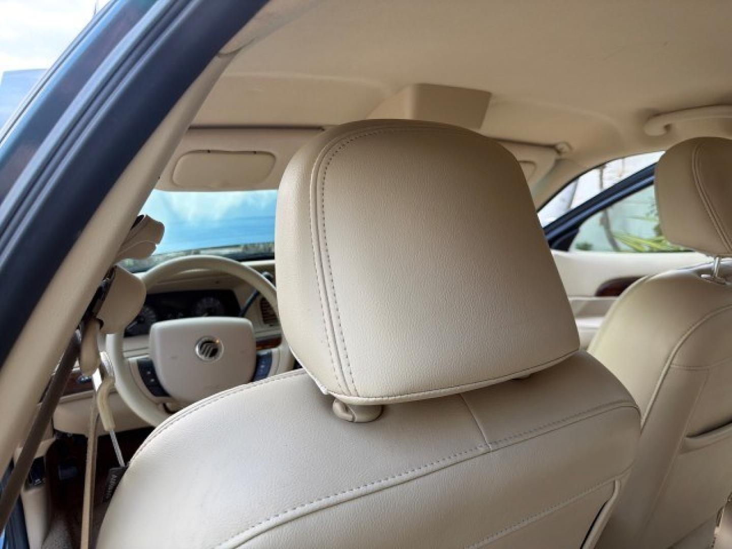 2007 Norsea Blue Pearl Metallic /Light Camel Mercury Grand Marquis LS LOW MILES 52,607 1 OWNER (2MEHM75V17X) with an 4.6L SOHC FFV V8 Engine engine, Automatic transmission, located at 4701 North Dixie Hwy, Pompano Beach, FL, 33064, (954) 422-2889, 26.240938, -80.123474 - OUR WEBPAGE FLORIDACARS1.COM HAS OVER 100 PHOTOS AND FREE CARFAX LINK 2007 Mercury Grand Marquis LS Sedan 4 DR 4.6L V8 F SOHC Flex Fuel 25 MPG Rear Wheel Drive Features ABS Brakes Air Conditioning Alloy Wheels AM/FM Stereo Automatic Transmission CD Audio Cruise Control Flex Fuel Vehicle Leather Seat- Photo#87