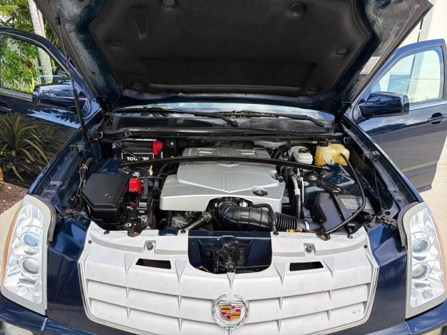 2008 Blue Chip /Cashmere/Cocoa Cadillac SRX SUNROOF LOW MILES 52,938 (1GYEE637380) with an 3.6L VVT V6 SFI Engine engine, Automatic transmission, located at 4701 North Dixie Hwy, Pompano Beach, FL, 33064, (954) 422-2889, 26.240938, -80.123474 - OUR WEBPAGE FLORIDACARS1.COM HAS OVER 100 PHOTOS AND FREE CARFAX LINK 2008 Cadillac SRX V6 4 Door Wagon/Sport Utility 3.6L V6 F Gasoline 24 MPG Rear Wheel Drive Features ABS Brakes Air Conditioning Alloy Wheels AM/FM Stereo Automatic Transmission Auxiliary Audio Input BOSE Sound System CD Audio Crui- Photo#9