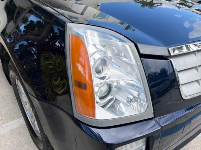 2008 Blue Chip /Cashmere/Cocoa Cadillac SRX SUNROOF LOW MILES 52,938 (1GYEE637380) with an 3.6L VVT V6 SFI Engine engine, Automatic transmission, located at 4701 North Dixie Hwy, Pompano Beach, FL, 33064, (954) 422-2889, 26.240938, -80.123474 - OUR WEBPAGE FLORIDACARS1.COM HAS OVER 100 PHOTOS AND FREE CARFAX LINK 2008 Cadillac SRX V6 4 Door Wagon/Sport Utility 3.6L V6 F Gasoline 24 MPG Rear Wheel Drive Features ABS Brakes Air Conditioning Alloy Wheels AM/FM Stereo Automatic Transmission Auxiliary Audio Input BOSE Sound System CD Audio Crui- Photo#24