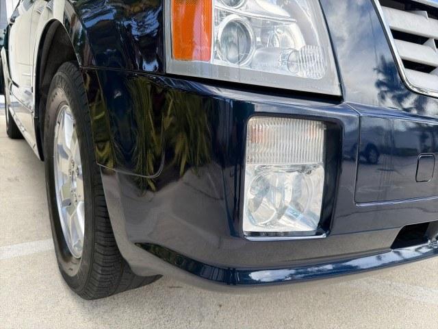 2008 Blue Chip /Cashmere/Cocoa Cadillac SRX SUNROOF LOW MILES 52,938 (1GYEE637380) with an 3.6L VVT V6 SFI Engine engine, Automatic transmission, located at 4701 North Dixie Hwy, Pompano Beach, FL, 33064, (954) 422-2889, 26.240938, -80.123474 - OUR WEBPAGE FLORIDACARS1.COM HAS OVER 100 PHOTOS AND FREE CARFAX LINK 2008 Cadillac SRX V6 4 Door Wagon/Sport Utility 3.6L V6 F Gasoline 24 MPG Rear Wheel Drive Features ABS Brakes Air Conditioning Alloy Wheels AM/FM Stereo Automatic Transmission Auxiliary Audio Input BOSE Sound System CD Audio Crui- Photo#25